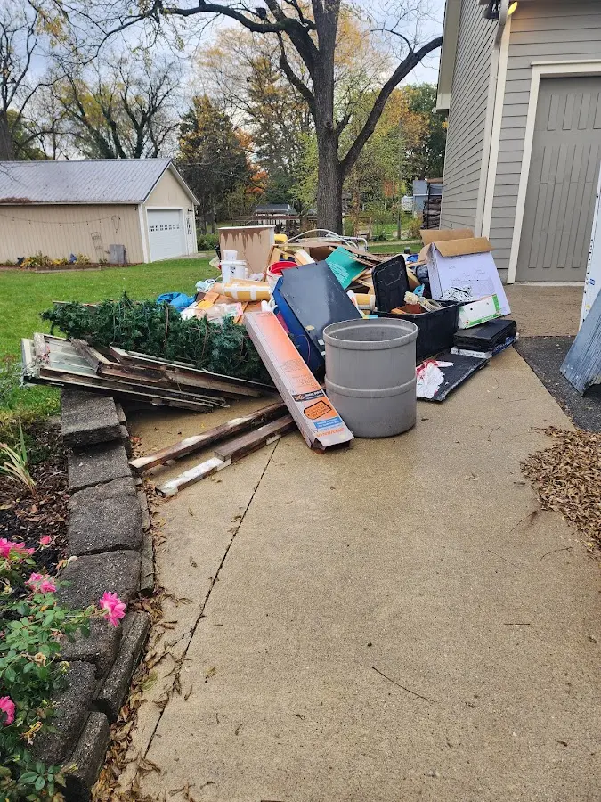 Dumpster being loaded with debris for Residential Dumpster Rental in Santee